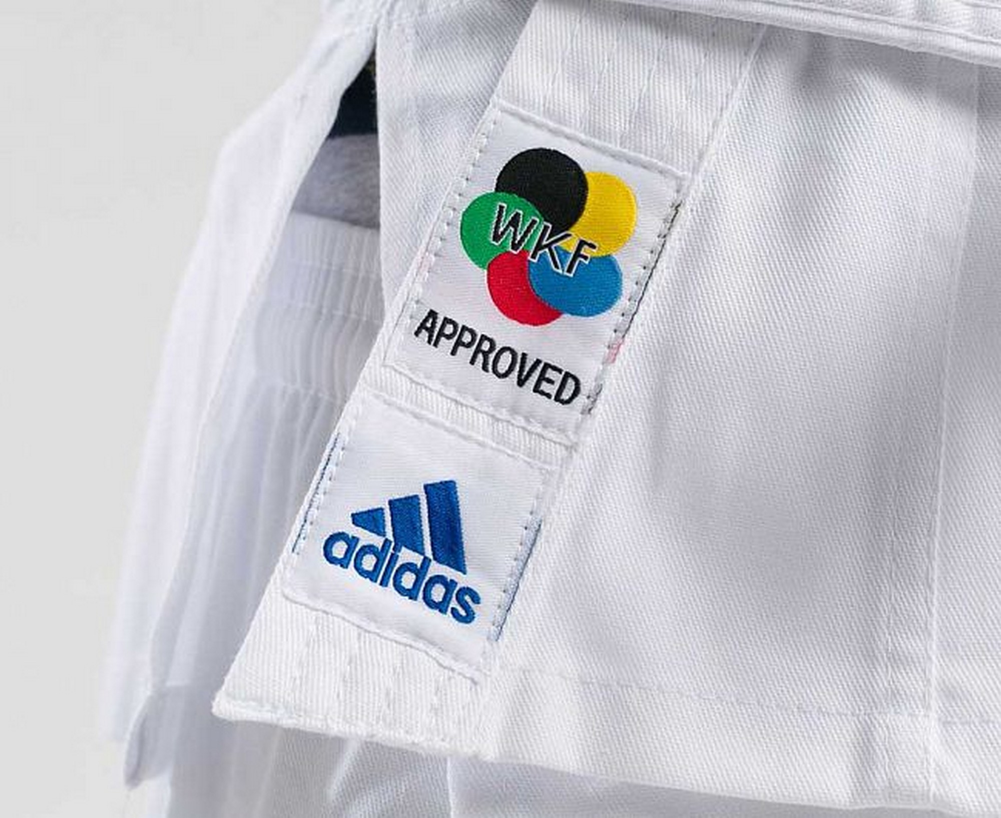 Кимоно для карате подростковое Adidas Evolution WKF K200E белый 2000_1634